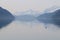 Lonely loon on Nahku Bay in morning in Alaska