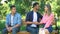 Lonely male sitting on bench at park, watching loving couple romantic feelings