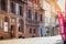 A lonely musician playing accordion in the empty street