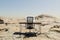 lonely pc workplace in large desert environment remote work and digital nomad and climate crisis concept 3D illustration