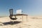 lonely pc workplace in large desert environment remote work and digital nomad and climate crisis concept 3D illustration