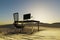 lonely pc workplace in large desert environment remote work and digital nomad and climate crisis concept 3D illustration