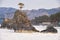 Lonely Pine tree on rock on Altai river Katun in winter. Rocks called Dragon\\\'s teeth, Dragon crest, or Sartakpai Arrows