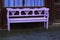 Lonely purple colored bench