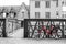 Lonely red bike standing in the typical street in Stockholm