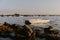 Lonely Rowboat On Peaceful Calm Water Ocean Bay