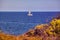 Lonely sailboat on Mallorca coast, Spain.