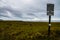 A Lonely Sign On The Beach of Long Beach Washington During An Overcast Autumn Evening