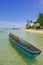 Lonely small boat at beautiful beach