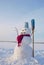 Lonely snowman at a snowy field