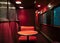 A lonely table and chair in a old railroad passenger car