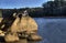 Lonely teen in hoodie texting on cell phone, Lake Allatoona, Red Top Mountain State Park, Georgia, USA