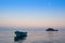 Lonely traditional greek fishing boat on sea water