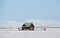 Lonely traditional icelandic house surrounded by snow landscape..