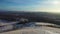 A lonely traveler climbing on the top of a mountain range. Travel concept in extreme conditions - view from drone.