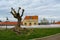 Lonely tree on the clouded sky background. Streets of Almada. Portugal. Travel. Tourism. Old town historic buildings. Europe.