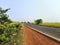 A lonely village road without any vehicles on it during the lock-down period