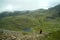 Lonely walker descending from Great Gable to Styhead Tarn