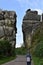 Lonely walker  at Externsteine in Teutoburger forest in germany