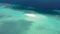 Lonely white sandbank in the middle of big ocean sea