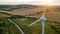 Lonely wind turbine in farm fields