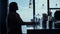 Lonely woman silhouette at sea view bar closeup. Stressed ceo in restaurant