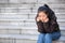 Lonely woman sitting on the stairs