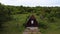 Lonely wooden cottage in mountain. Rural scene of wooden mountain house. Aerial drone view