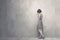 lonely young woman stands in front of a gray wall