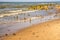 Lonesome beach of the Baltic Sea with old groins and wave breakers