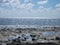 lonesome beach with water reflections