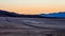 Lonesome street through Death Valley National Park in the evening