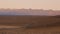 Lonesome street through Death Valley National Park in the evening