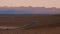 Lonesome street through Death Valley National Park in the evening