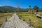 Long Bamboo Bridge in rice flied