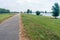 Long bike path along a wide Dutch river