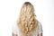 Long Blonde Curly Hair , Rear View On White Background. Generative AI