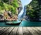 Long boat and rocks on railay beach in Krabi