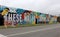 Long brick wall with bright colorful words filled with hope, Austin Texas, 2018