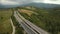 The long bridge along the forest in Italy