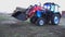 Long bucket tractor demonstrates work. Barnaul 2018