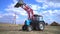 Long bucket tractor demonstrates work. Barnaul 2018