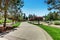 Long concrete driveway of American luxury house