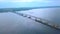 The long Crimean Bridge. Clip . The view from the drone. A huge long bridge across the sea with cars connecting the