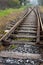 Long crossing railways during the cloudy day