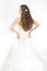 Long curly hair. Bride hairstyle. Back view