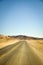 Long Desert Road in the Middle of the Death Valley