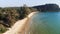 Long deserted beach with white sand and clear water. Aerial top view. Coast of island Koh Rong Samloem, Cambodia