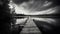 a long dock sitting on top of a lake under a cloudy sky