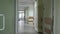Long empty light corridor in hospital